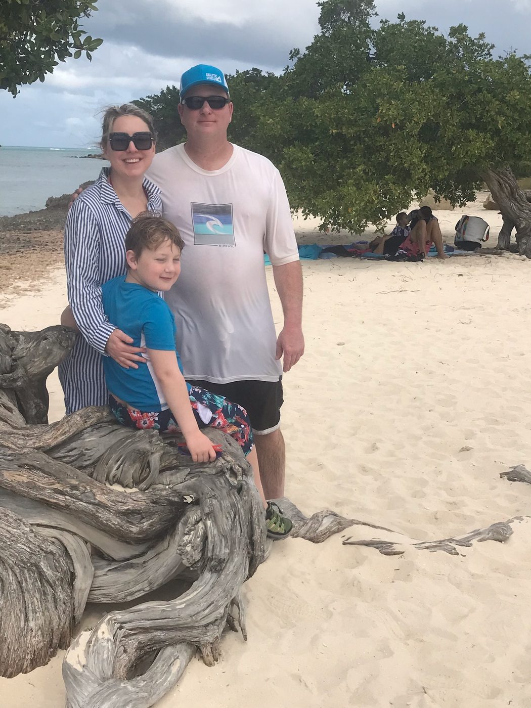 Ericka McCauley with her family at the beach