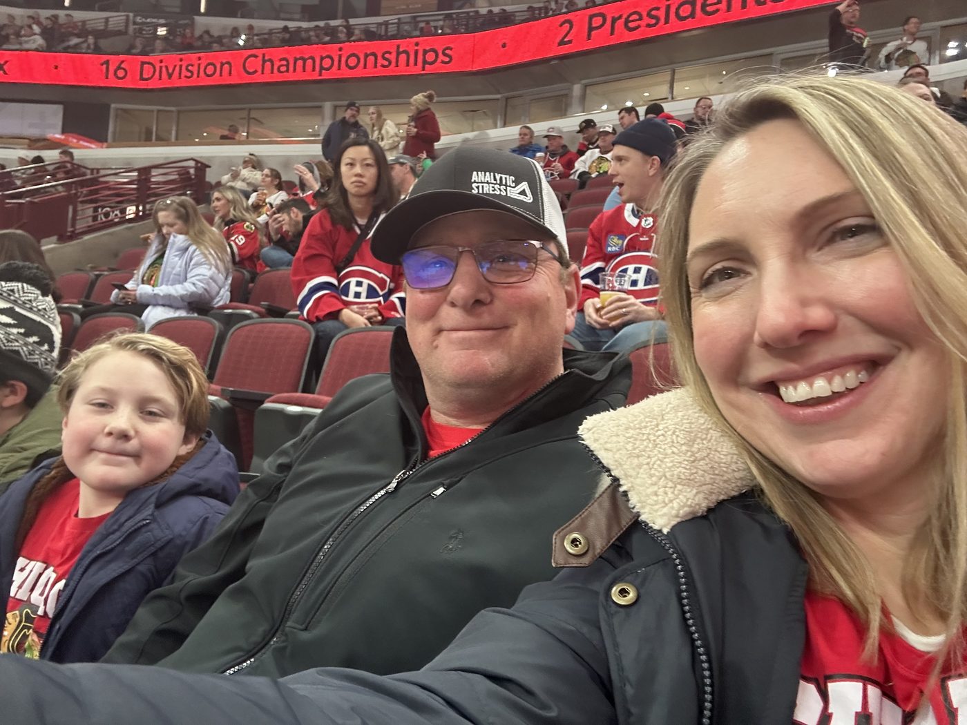 Ericka McCauley and her family at a hockey game